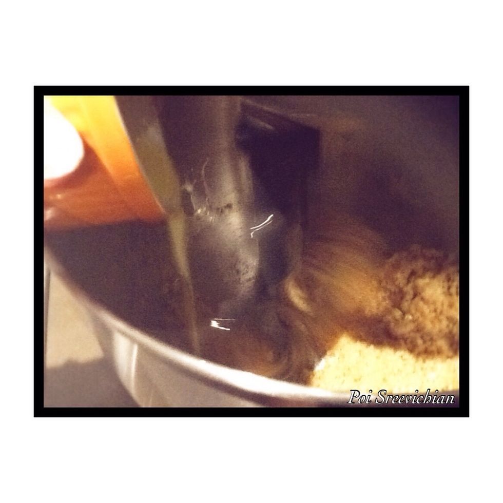 Put the crushed biscuit in the electric Mixer and start mixing while it's mixing slowly pour the melted butter in the electric mixer and wait until the biscuits are sticky