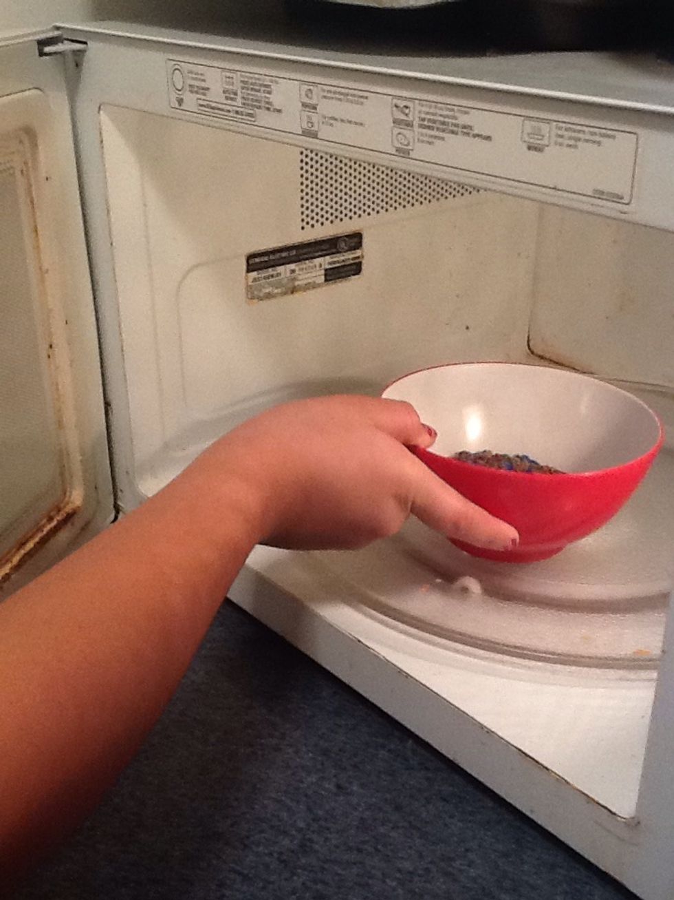 Put the crushed m&ms in the microwave