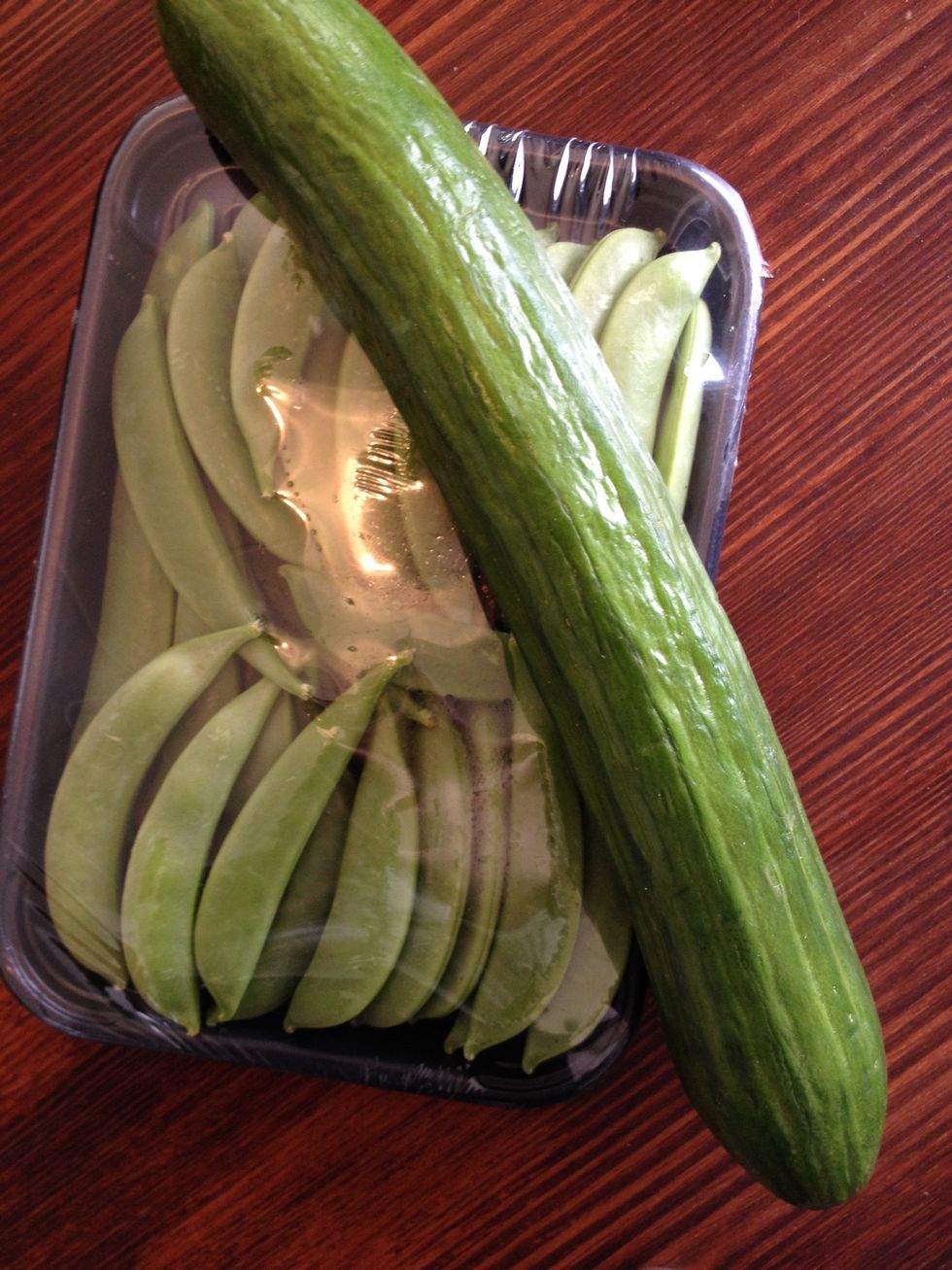 Put the cucumber and your snow peas in the basket.