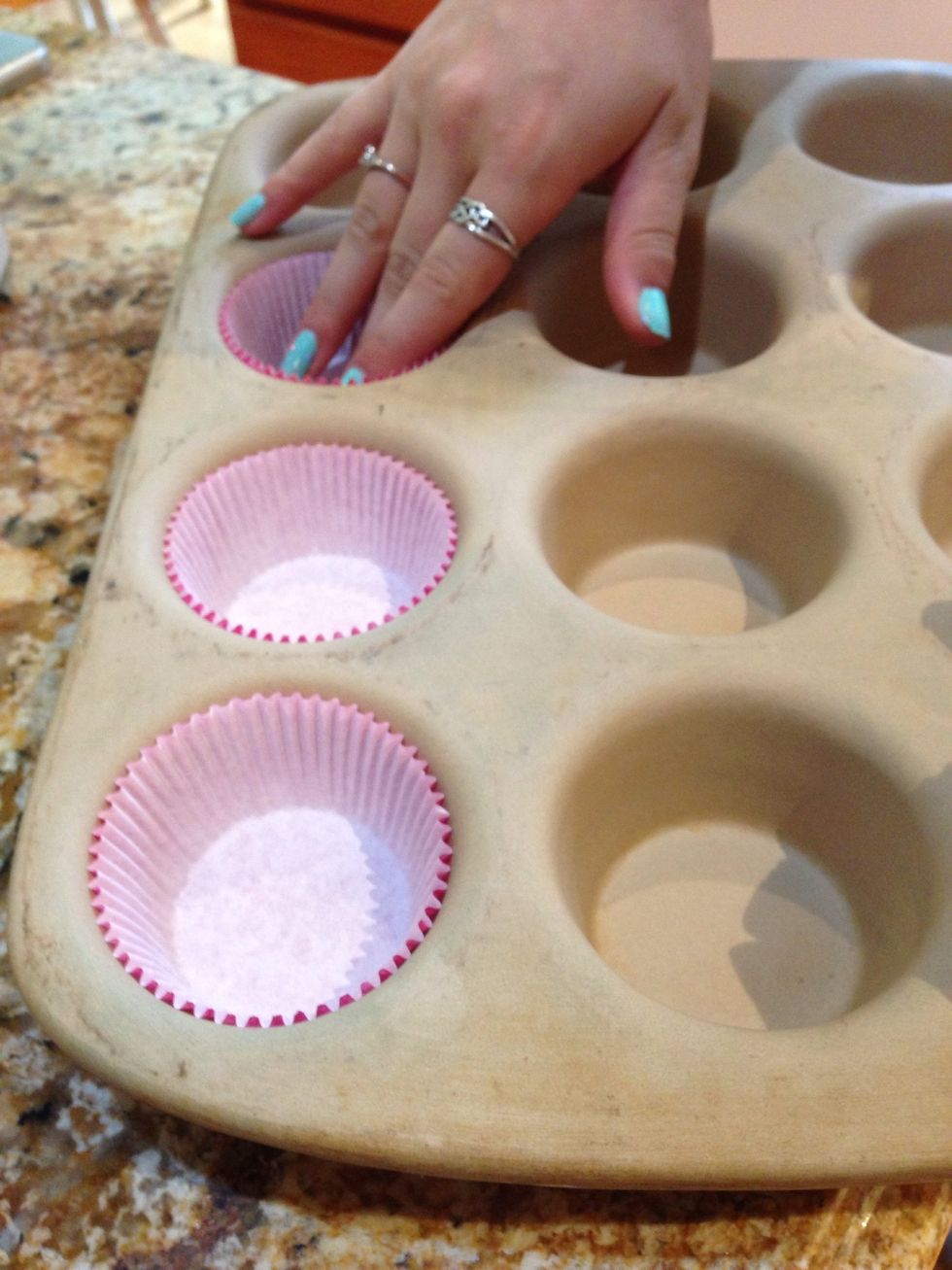 Put the cupcake liners in your pan. Or spray it with PAM.