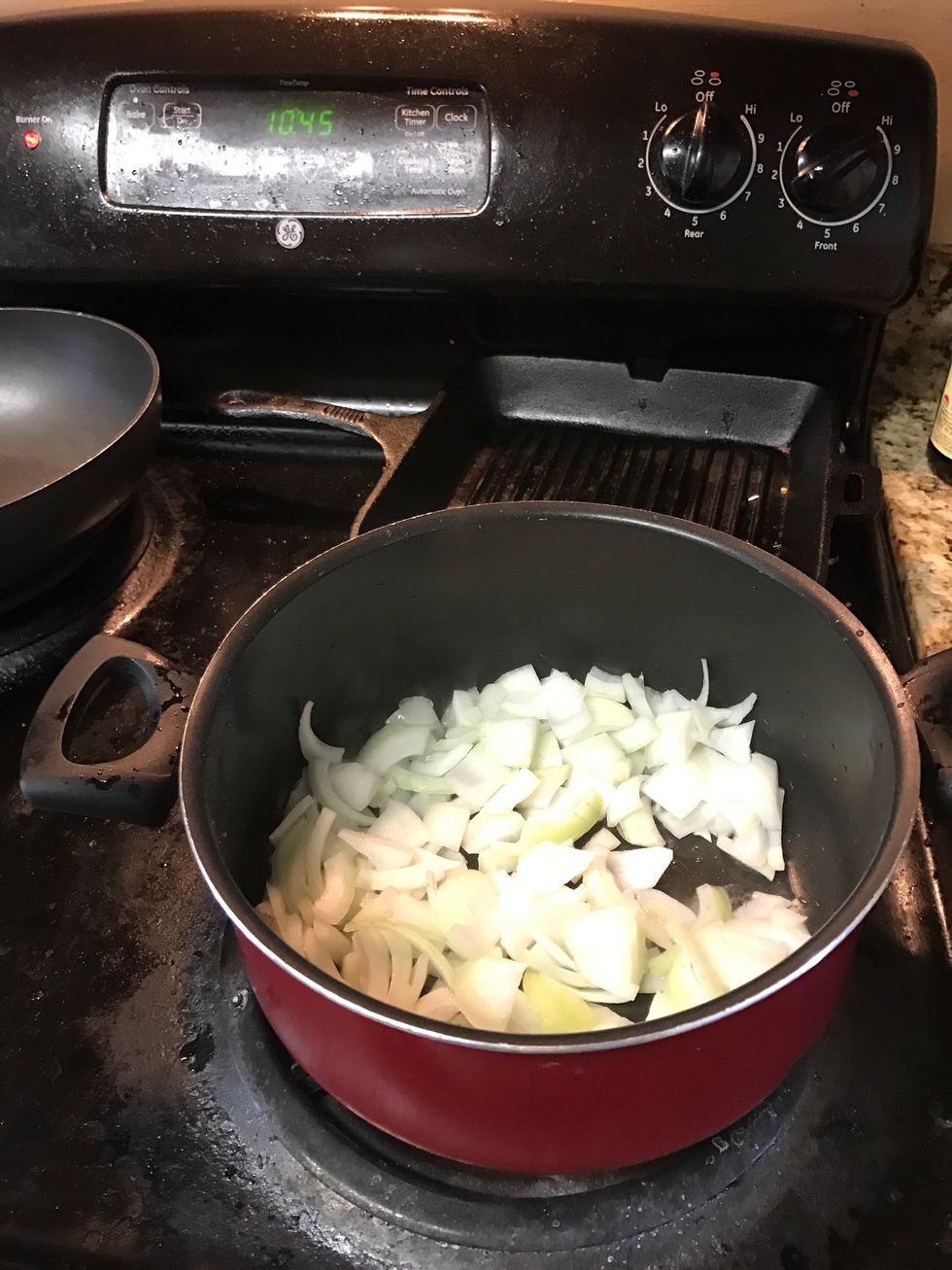 Put the cut onions into the pot. Stir-fire the onions until it looks like softer.