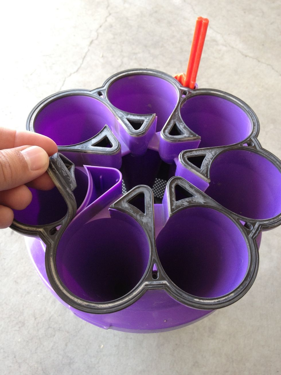 Put the cyclone back together by carefully replacing the top seal.