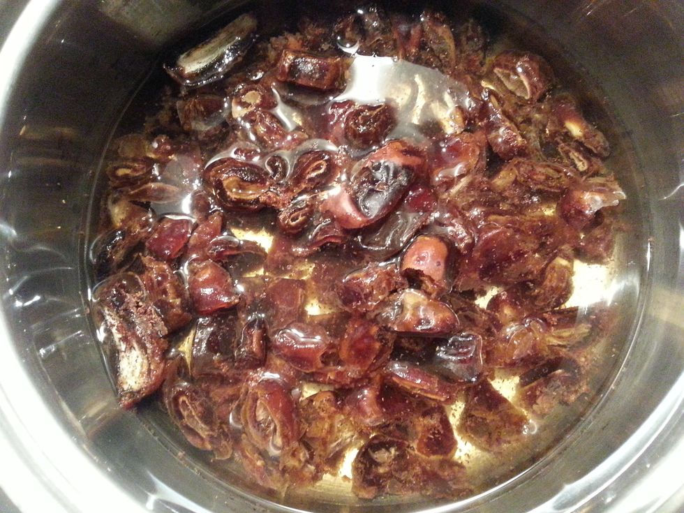 Put the dates and water in a small saucepan over medium heat. Bring to the boil. Reduce the heat and simmer for 3-5 minutes, or until pulpy.