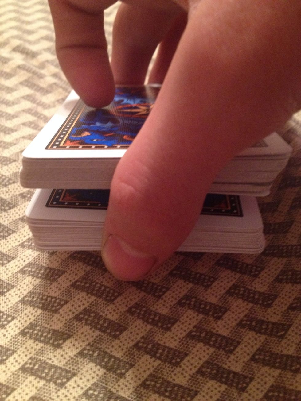 Put the deck with the pinky break on top while keeping the break.