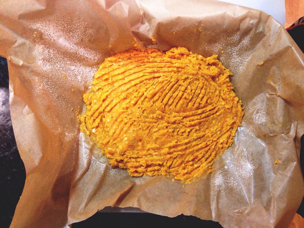 Put the dough in the baking tray and form a round pizza. Heat in the oven on 200 degrees celcius for 15-20 mins until golden