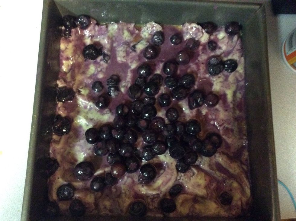 Put the dough into the pan and put blueberries on the top