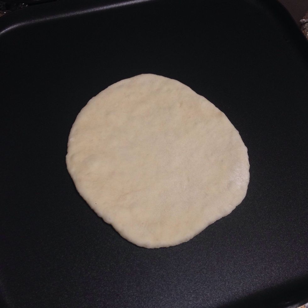 Put the dough on the pan for few seconds