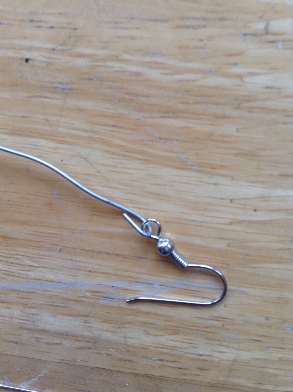put the earring hook inside the loop