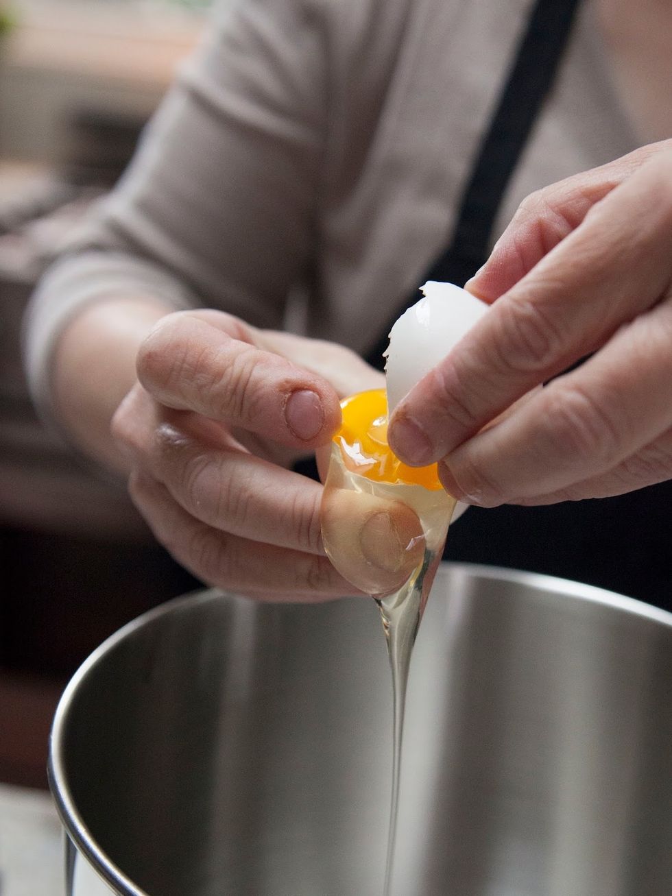 Put the egg whites in a large bowl or the bowl of a stand mixer.