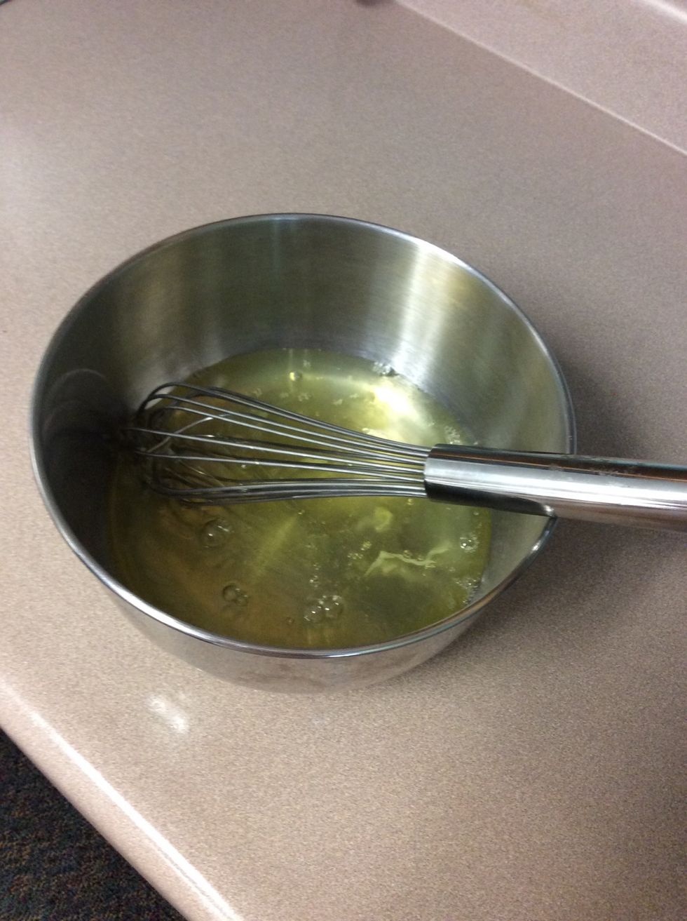 Put the egg whites in a metal bowl and get a whisk.