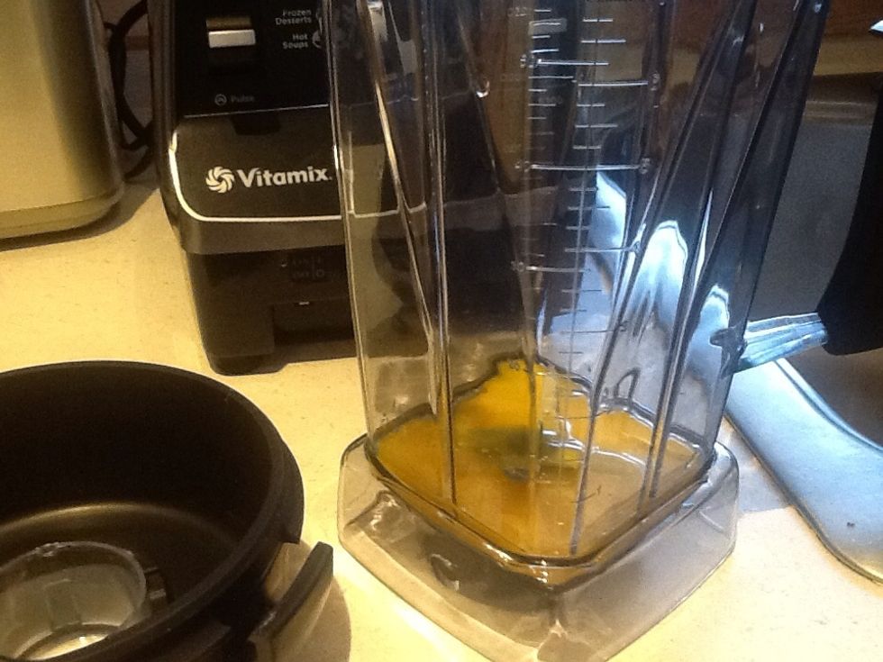 Put the egg yokes in the high speed blender with 1/2 can coconut milk. Blend then turn up higher for 4-6 minutes. When hot and custardy, add ghee, vanilla, xylitol, berries and 1 1/2 can coconut milk.