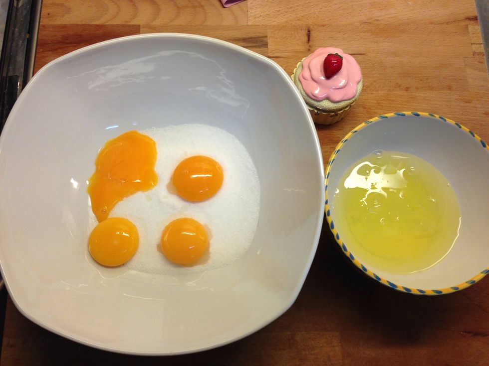 Put the egg yolk with the sugar in your mixing bowl  and the egg whites in a separate bowl.