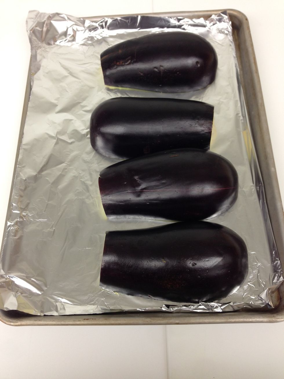 Put the eggplant on the pan.