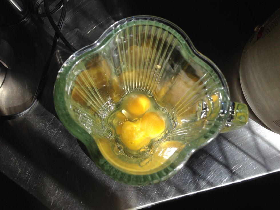 Put the eggs in a blender (or use a bowl/whisk).