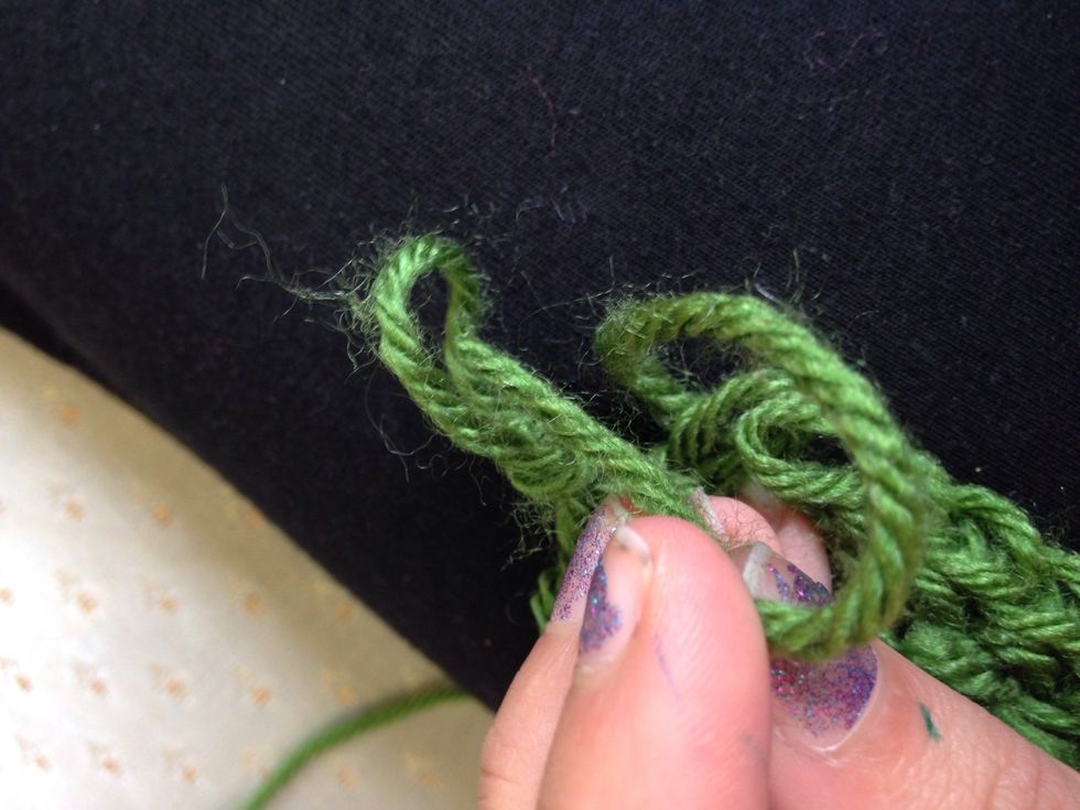 Put the end of the string into the hole