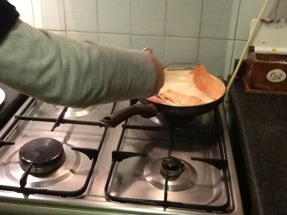 Put the fillet chicken on the pan and fry it.