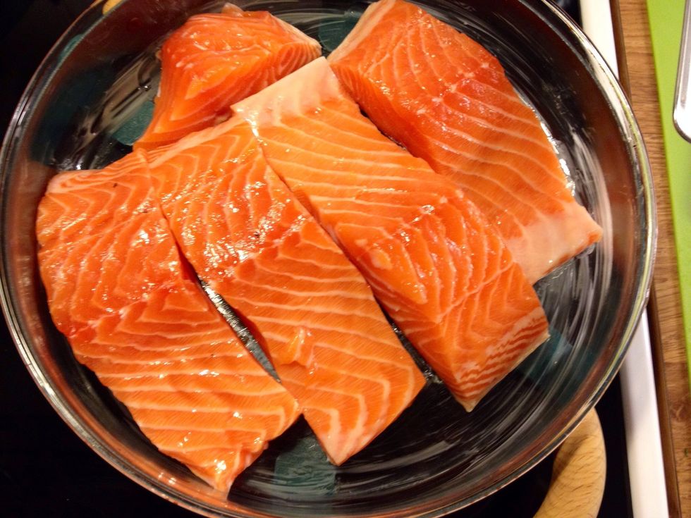 Put the fillets in a greased oven dish. Add salt & pepper.