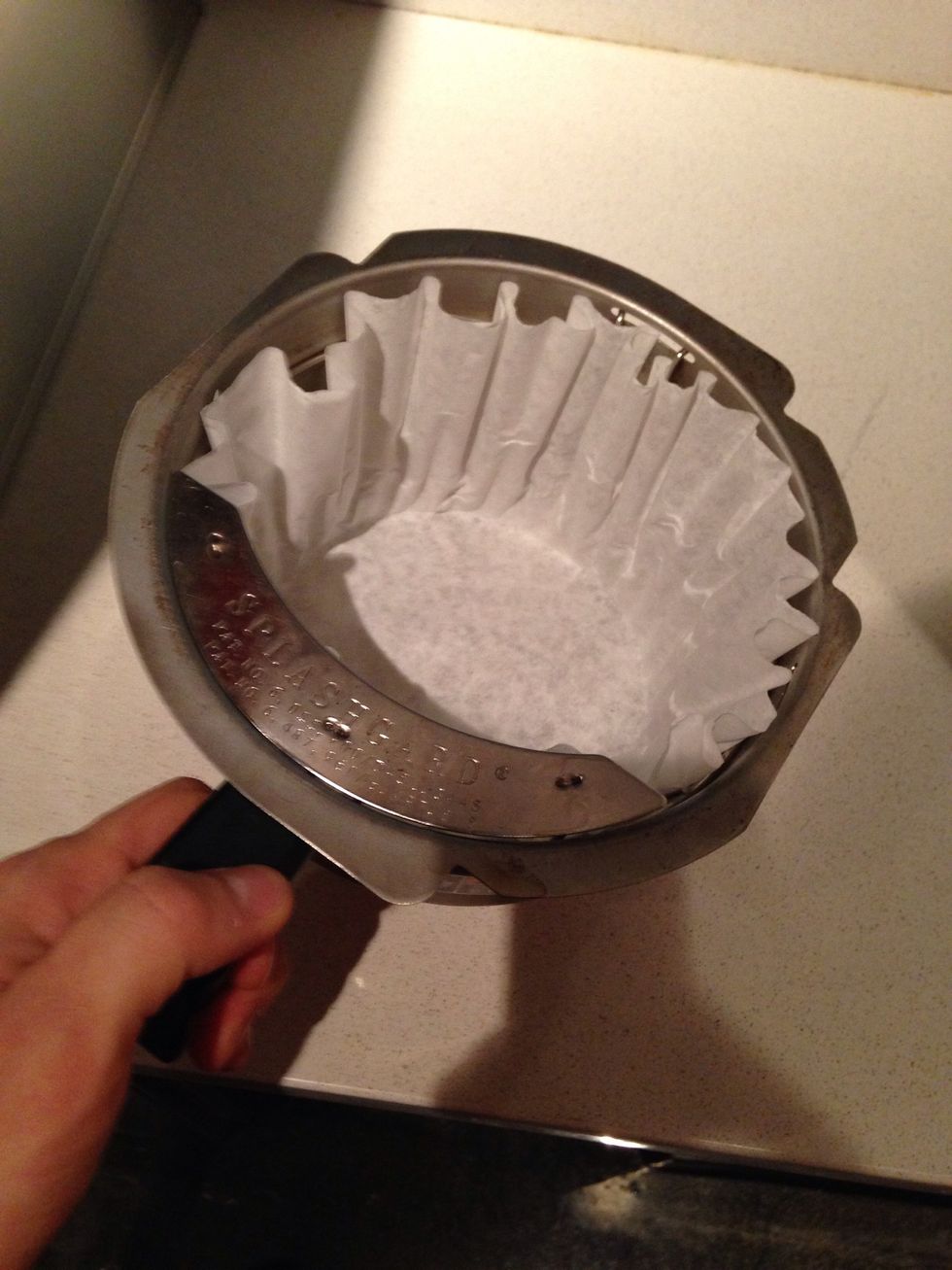 Put the filter in the filter holder