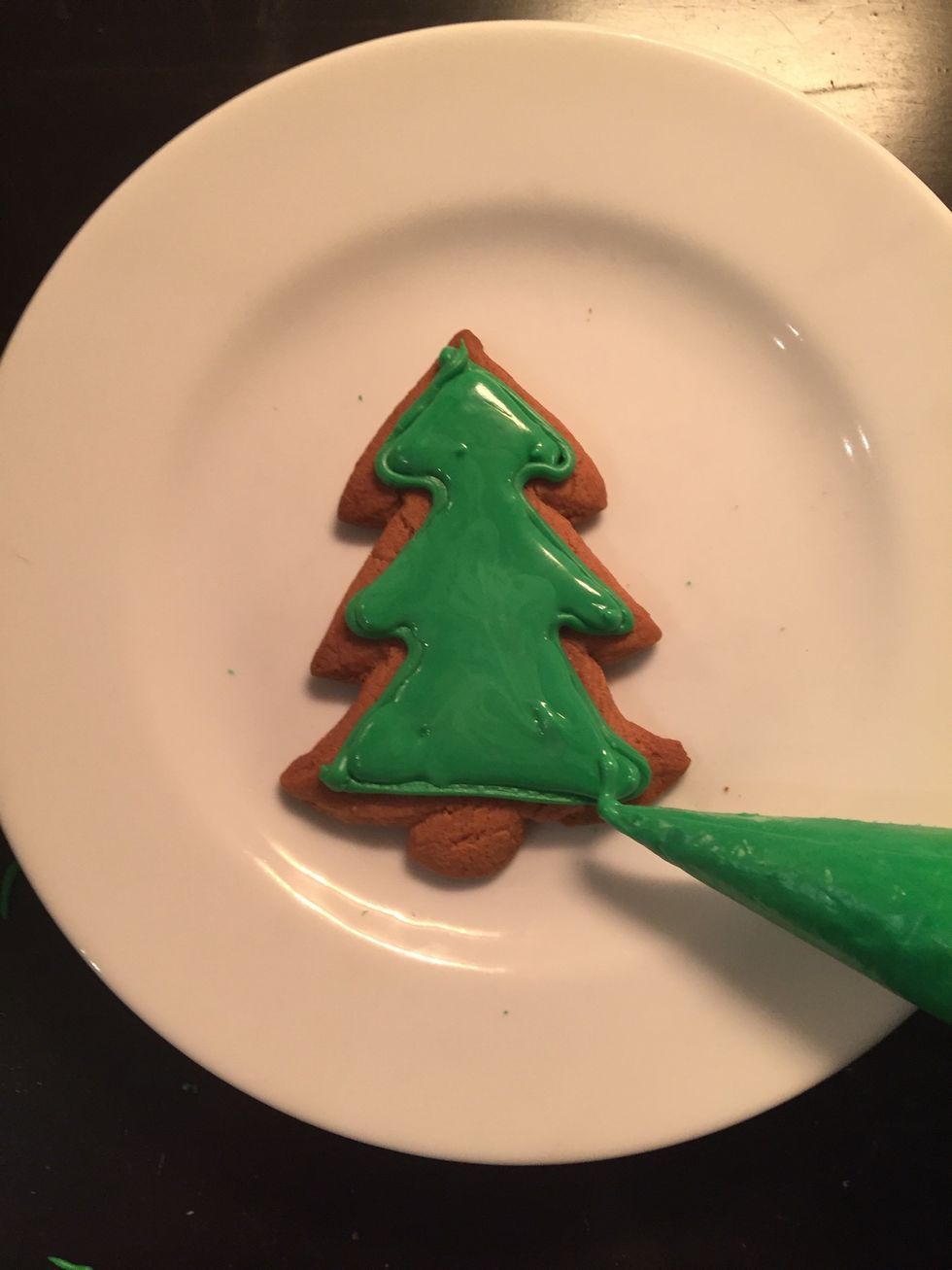 Put the finished cookies in a very low oven for 15 minutes, for the icing to harden.