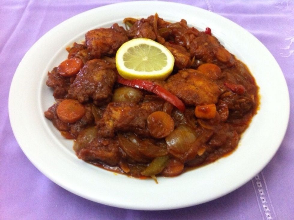 Put the fish into the tomato mixture and stir them well ,, serve it with a white rice if you want