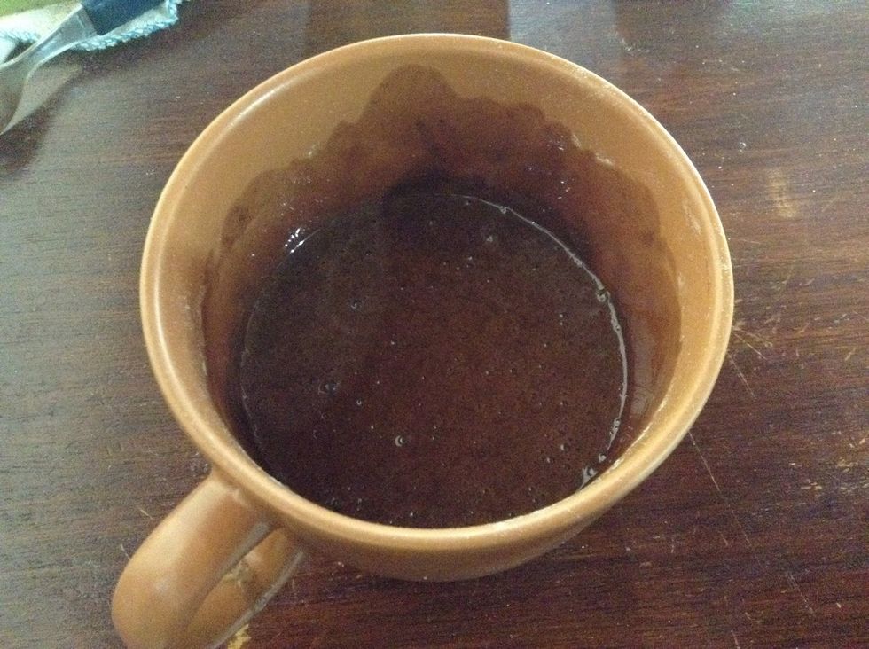 Put the flour and the baking powder and kindly stir... Once mixed put on microwave for 3 minutes on high!