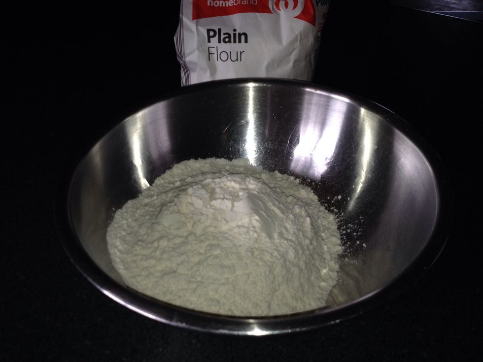 Put the flour in a mixing bowl.