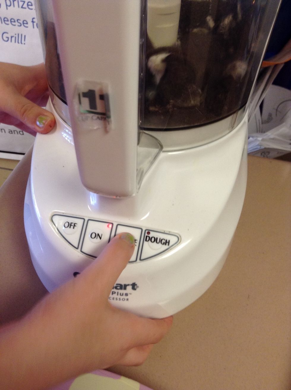 Put the food processor on pulse.