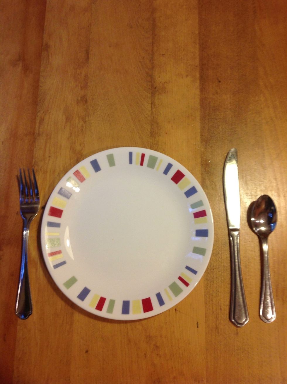 Put the fork on the left side of the plate.