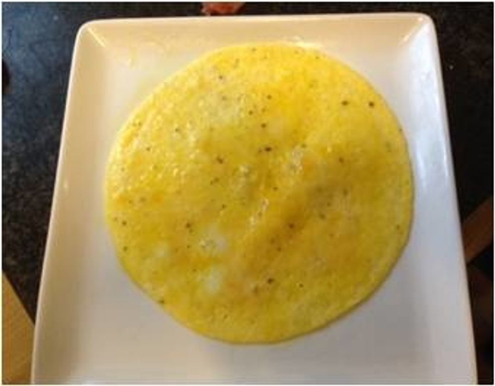 Put the fried eggs at the centre of the plate