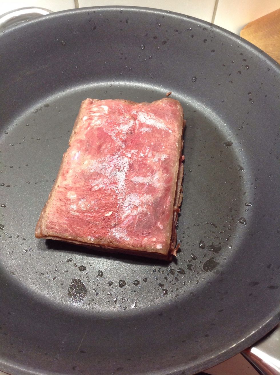 Put the frozen reindeer in frying pan (without oil or butter) to dry it and to divide it into smaller pieces.