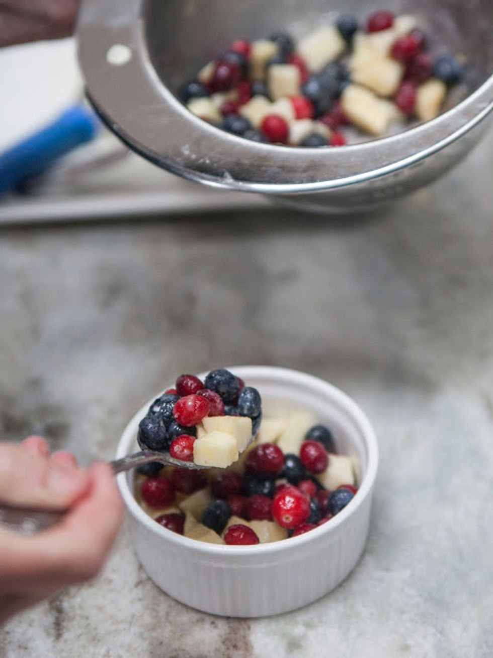 Put the fruit into the ramekins or baking dish.