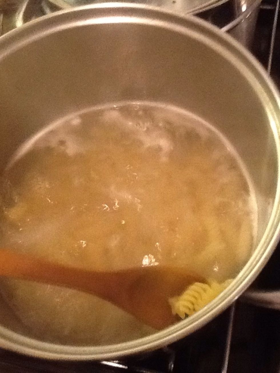 Put the fussili in boiling water with a teaspoon of salt