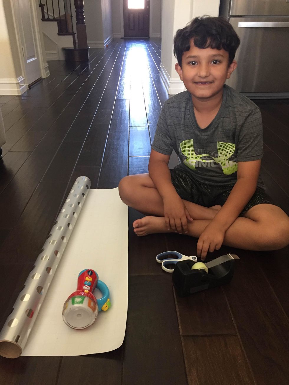 Put the gift on wrapping paper.