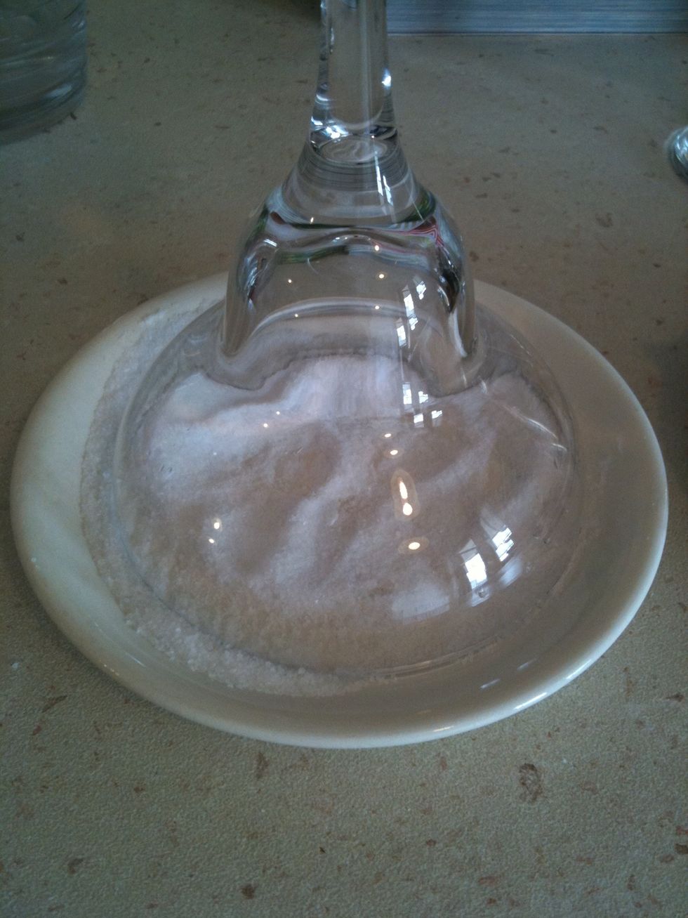 Put the glass upside down on the wet towel and then into the salt
