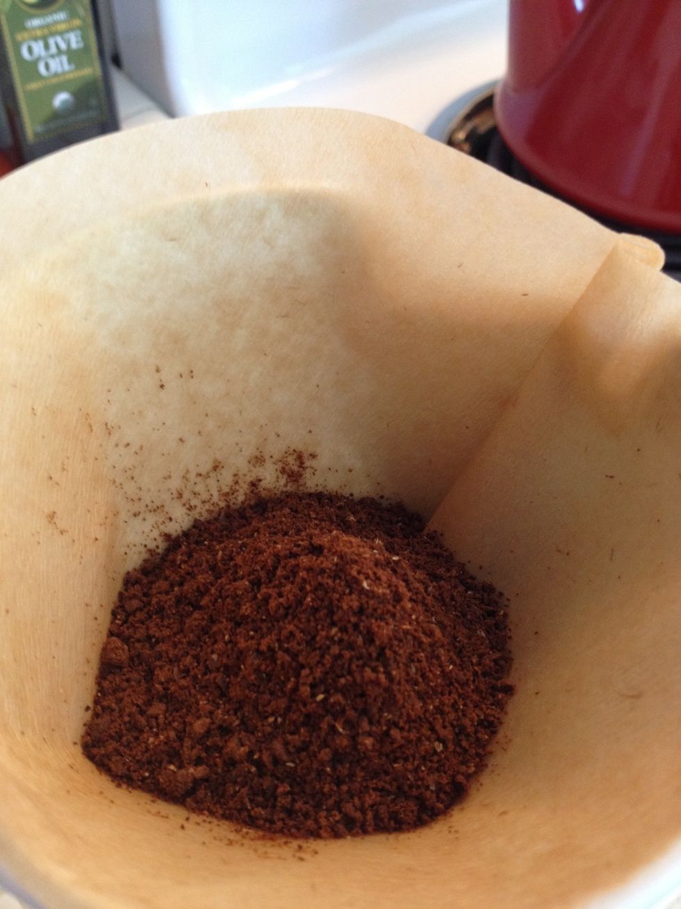 Put the ground coffee into the coffee cone in a heap so it's higher in the middle.