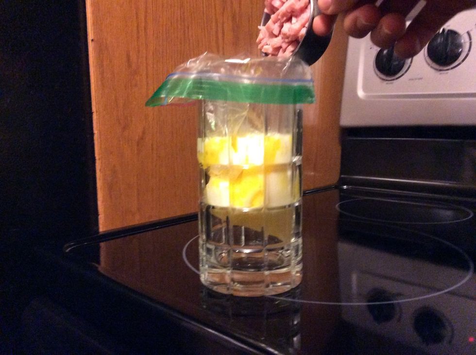 Put the ham and cheese in the zip lock bag.