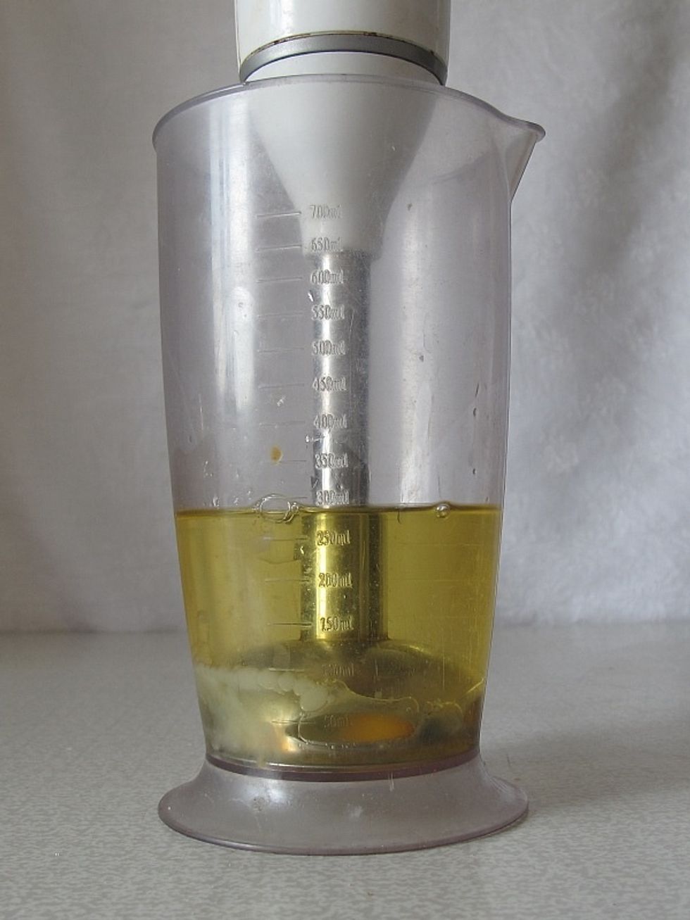 Put the hand blender stick in the bowl over the egg and turn on the blender