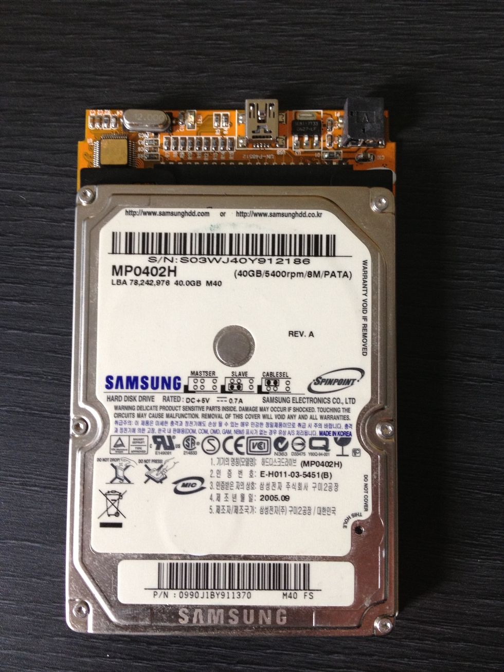 Put the harddisk and board on the work table
