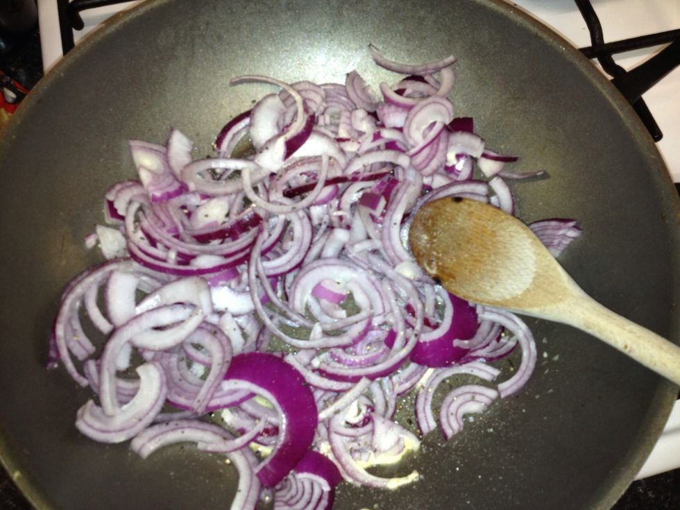 Put the hob on a high heat. Toss your onions in olive oil/ flora and add salt and pepper for seasoning and put the gas to a high heat. Note: the bacon is salty so don't over do it on the salt