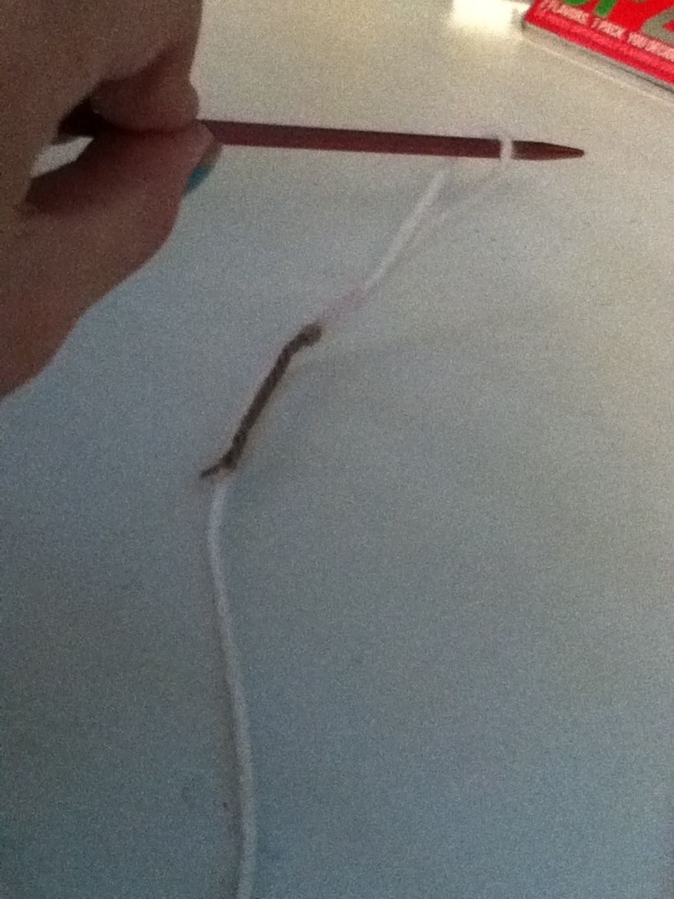 Put the hole on a needle