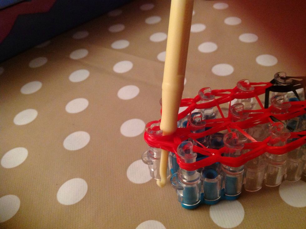 Put the hook through all the bands at the end.
