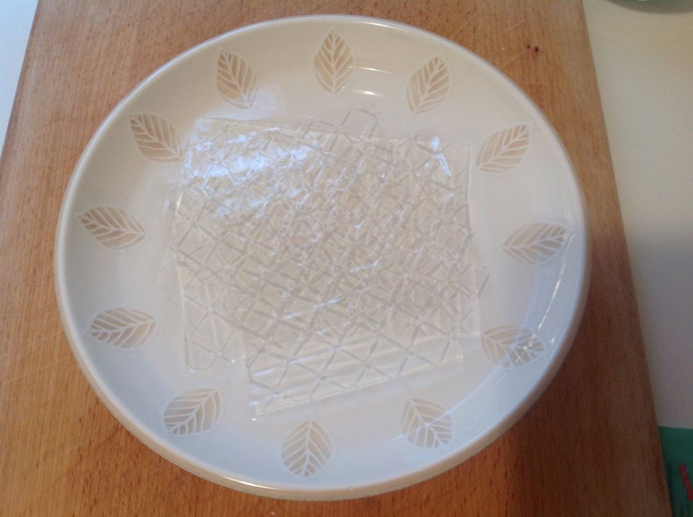 Put the isinglass in a bowl with warm water