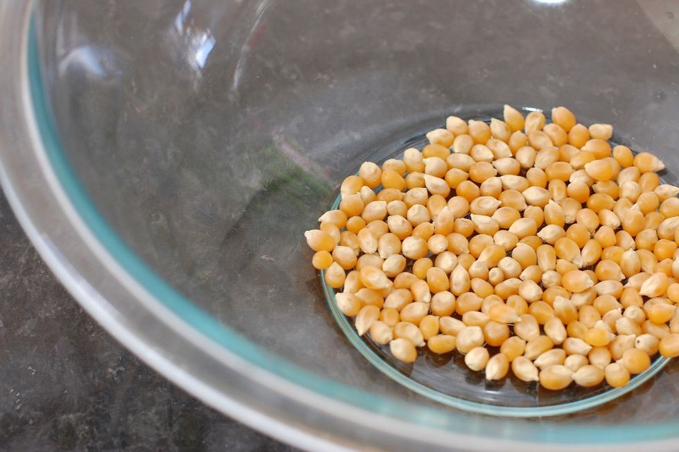 Put the kernels into a bowl.