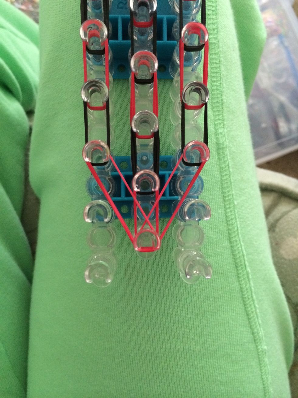 Put the last 2 sets of red bands in a long V-shaped this is going to help with the shape of the tie.