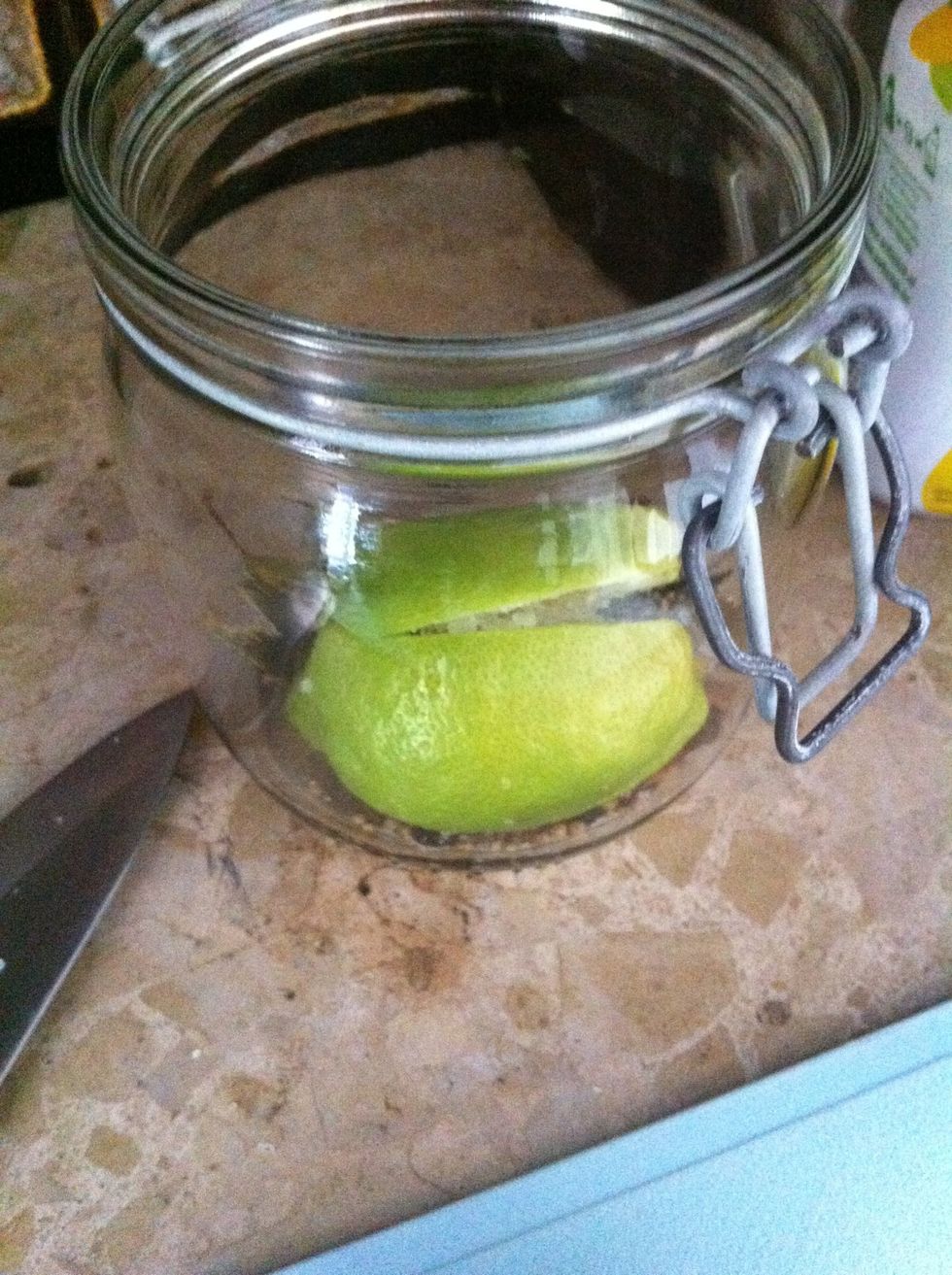 Put the lemons in the jar.