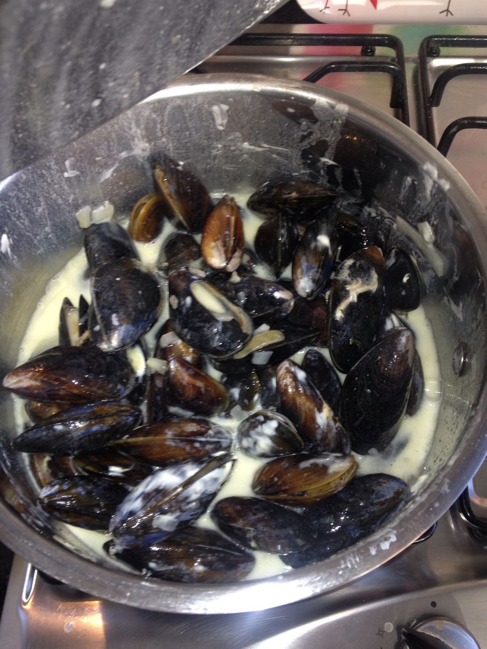 Put the lid and shake the pan! It may not look great at this moment in time but that's because the creme freche has not yet heated and worked its magic with the other ingredients