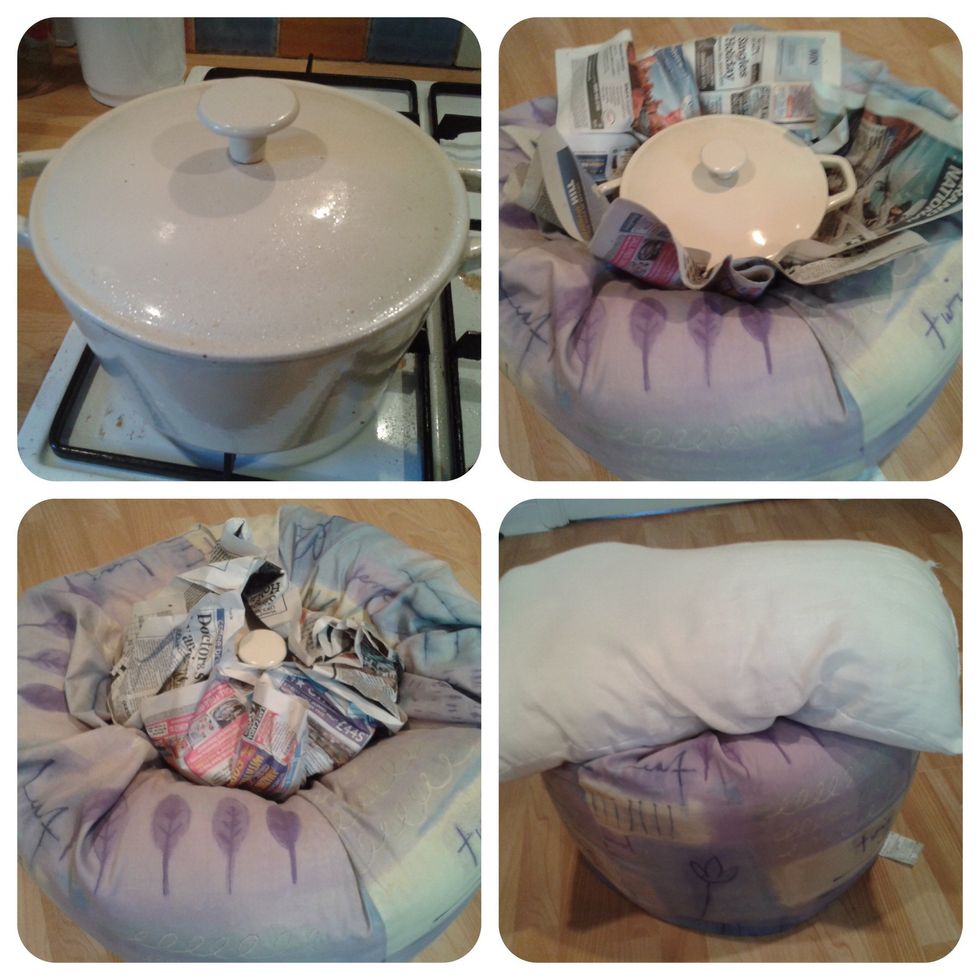 Put the lid on the pot tightly, nestle it deep into the hollow, wrap the newspaper around it and put the pillow on top. The bean bag will act like a slow cooker and stay hot for hours.