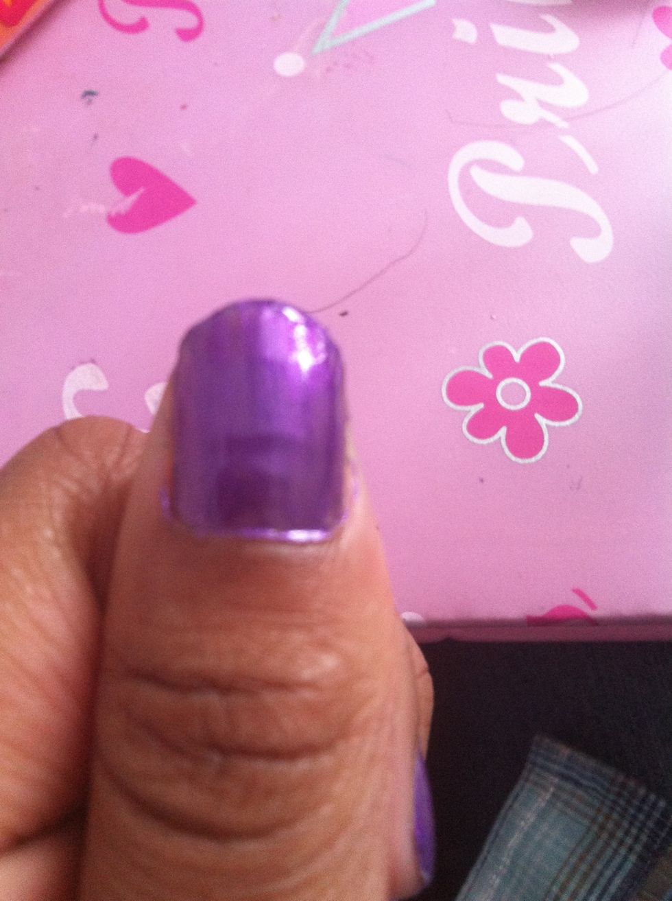 Put the lighter color all over your nails as wait for them to completely dry