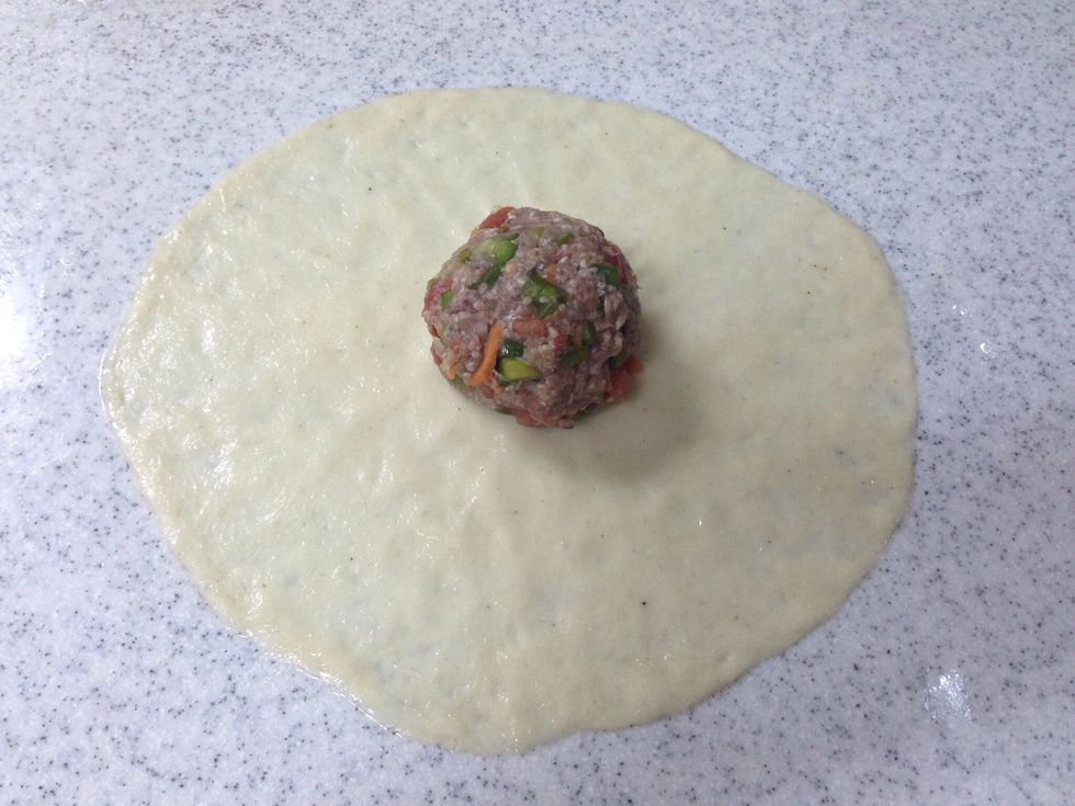 Put the meat ball in the middle
