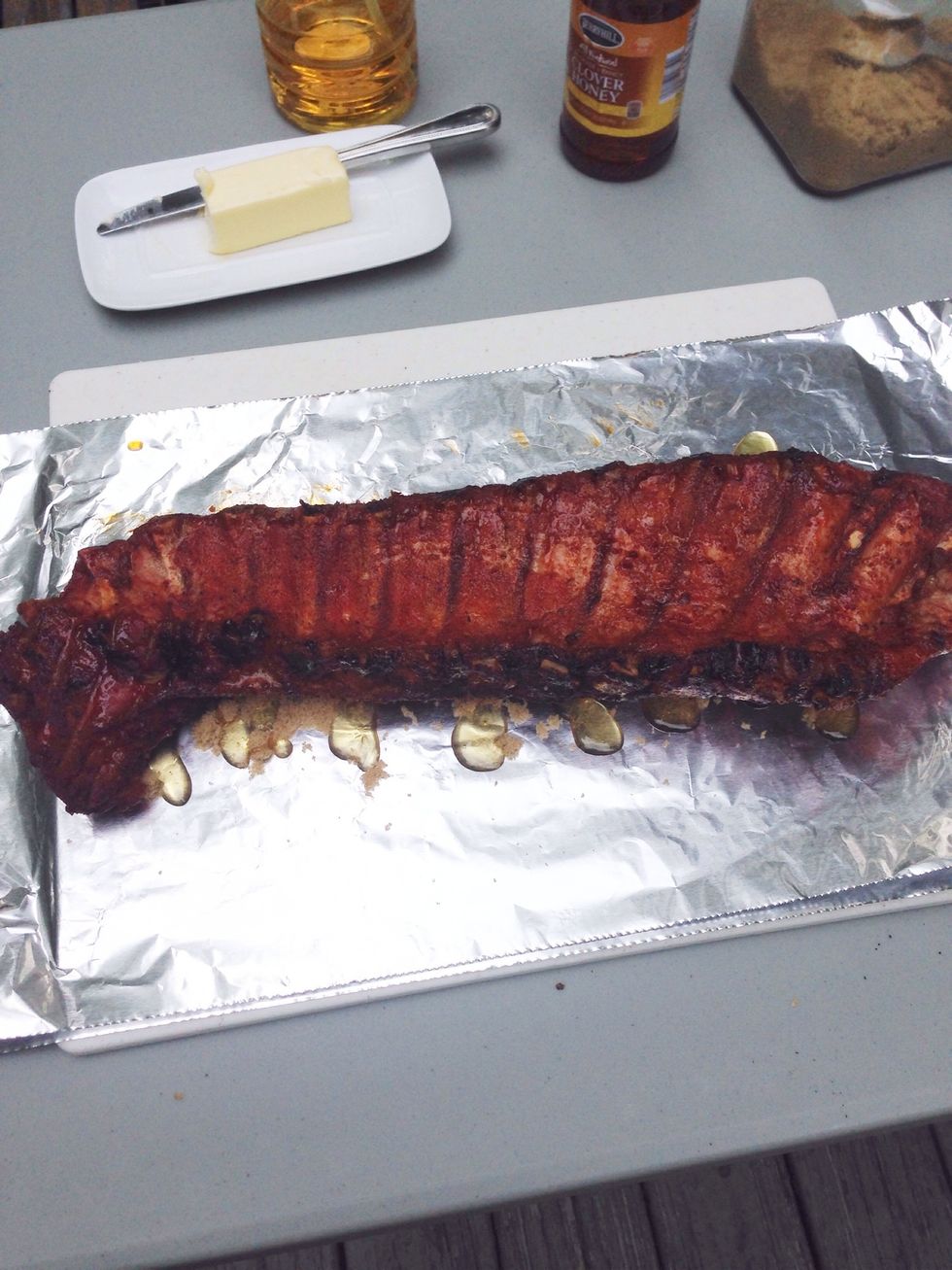Put the meaty side down, and then wrap the ribs up very well.
